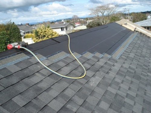 image of roof shingle installation