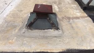 an image of weep holes covered by a previous roofing contractor Four Twelve found upon roof inspection.
