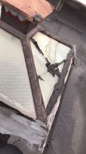 A pyramid skylight with cracked glass found during a skylight replacement.