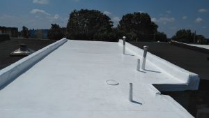 Silicone coating for a flat roof.