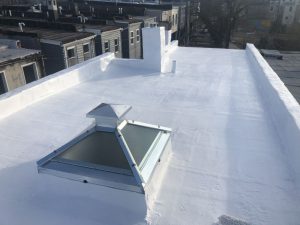 A flat roof with a pyramid skylight