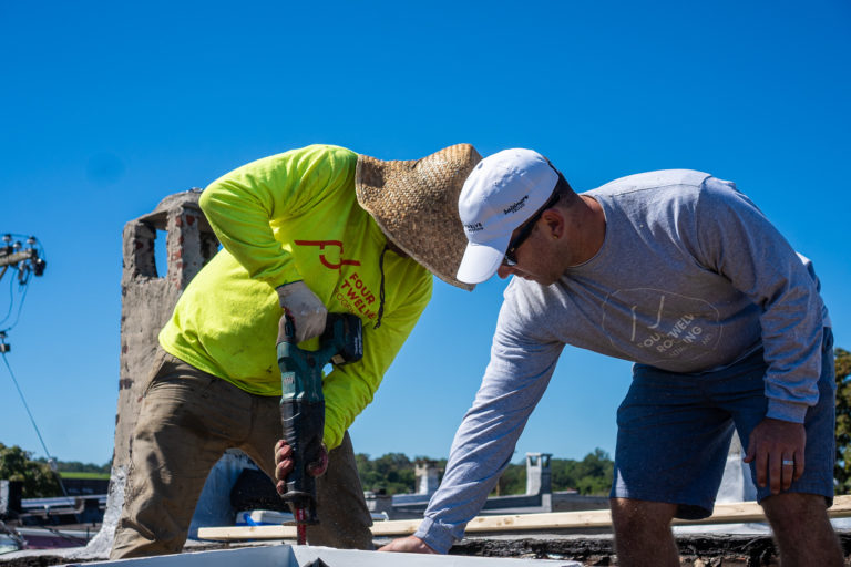 Roofing in Elkridge MD on a roof top.